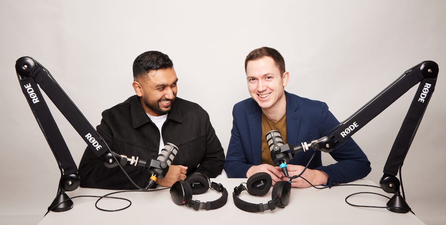 The hosts recording in the studio